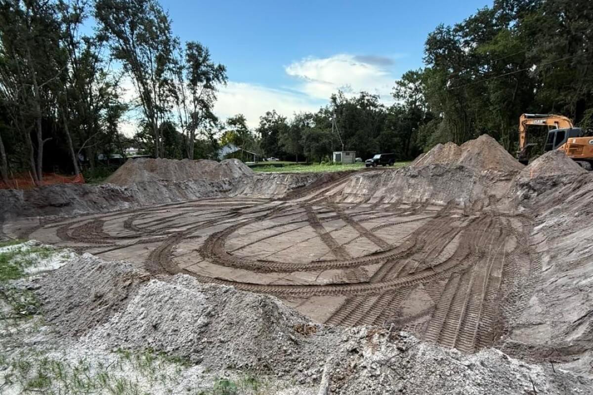 Site preparation with heavy equipment and dirt work in Central Florida